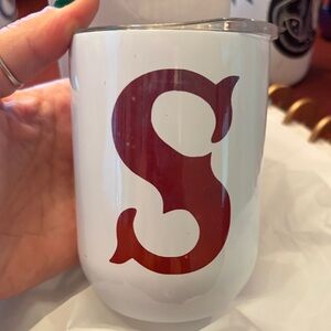 White Tumbler with Red “s” Initial